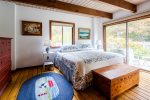Main floor king bedroom with private deck